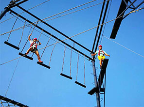 team building playground, high ropes challenge, rock climbing wall