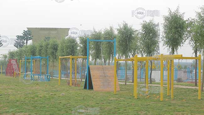 adventure park, outdoor adventure playground, obstacle course